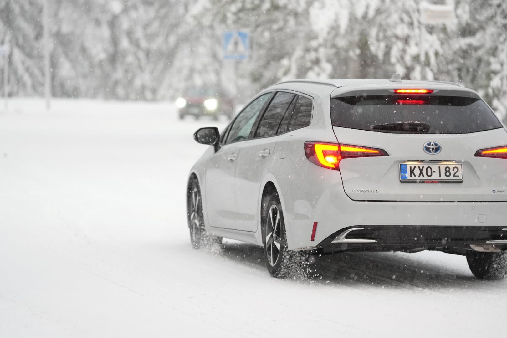 Snow-covered road in Finnish Lapland near Rovaniemi